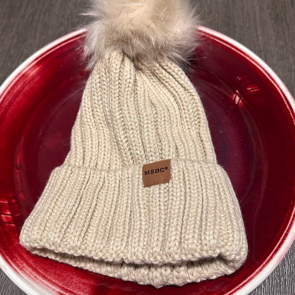 Brand New MSDC Women's Knit Oatmeal Color Beanie featuring a Playful Pom-Pom